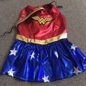 Two costumes, size small. Wonder Woman and Supergirl.